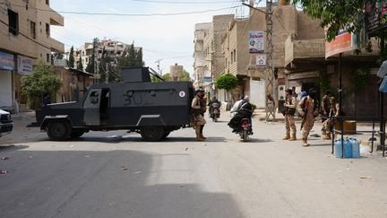 Des heurts sont survenus à proximité et au sud de Damas notamment à Jaramana entre combattants druzes et groupes armés liés au pouvoir sunnite du président Ahmad al-Chareh. (RAMI ALSAYED / NURPHOTO / VIA AFP)